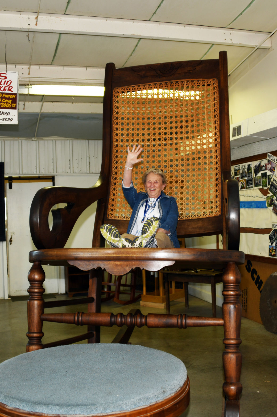 022 Agnes Loukota on Iowa's largest solid walnut rocker.JPG